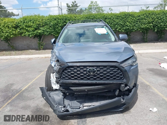 2022 Toyota Corolla Cross LE with VIN 7MUBAAAG1NV004852, listed as a IAAI auction lot 42251301 with 50,197 mi miles and . Bid and sale history available at DreamBid. Image 13.