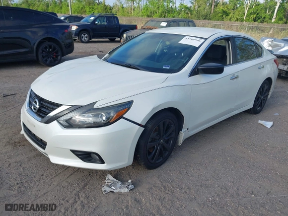 2017 Nissan Altima 2.5 SR with VIN 1N4AL3AP4HC231332, listed as a IAAI auction lot 41966946 with 151,015 mi miles. Bid and sale history available at carsss.com. Image 16.