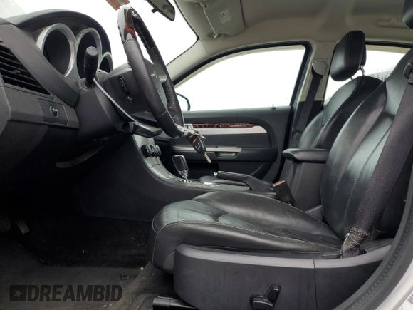 2010 Chrysler Sebring Limited with VIN 1C3CC5FD2AN194728, listed as a Copart auction lot 74457124 with 90,556 mi miles and Salvage title. Bid and sale history available at DreamBid. Image 7.