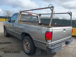 1994 Mazda B-Series Truck z VIN 4F4CR12A3RTM46760, wystawiony jako IAAI lot #41916078 z przebiegiem 276 129 mil mil oraz . Historia ofert i sprzedaży dostępna na DreamBid. Obrazek 3.