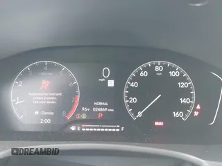 2023 Honda Civic Sport z VIN 19XFL2H89PE001737, wystawiony jako IAAI lot #41689390 z przebiegiem 24 869 mil mil oraz . Historia ofert i sprzedaży dostępna na DreamBid. Obrazek 7.
