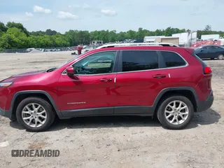 2016 Jeep Cherokee Latitude with VIN 1C4PJLCB8GW320099, listed as a IAAI auction lot 42236076 with 186,000 mi miles and . Bid and sale history available at DreamBid. Image 14.