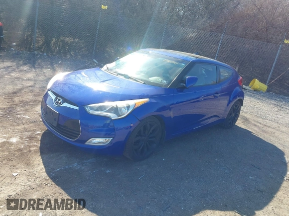 2012 Hyundai Veloster w/Black Int z VIN KMHTC6AD9CU046041, wystawiony jako IAAI lot #41772806 z przebiegiem 110 098 mil mil oraz . Historia ofert i sprzedaży dostępna na DreamBid. Obrazek 2.