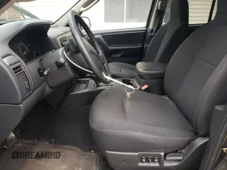 2004 Jeep Grand Cherokee Laredo with VIN 1J4GW48S94C431302, listed as a Copart auction lot 53433245 with 137,690 mi miles and Salvage Title. Bid and sale history available at carsss.com. Image 7.