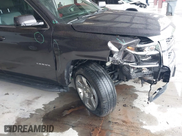 2017 Chevrolet Tahoe LT with VIN 1GNSKBKC8HR326004, listed as a IAAI auction lot 42256494 with 101,486 mi miles and . Bid and sale history available at DreamBid. Image 6.