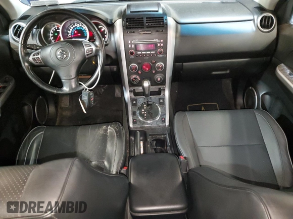 2012 Suzuki Grand Vitara Limited z VIN JS3TD0D77C4101382, wystawiony jako Copart lot #60017895 z przebiegiem 118 024 mil mil oraz Szkoda całkowita • Salvage title. Historia ofert i sprzedaży dostępna na DreamBid. Obrazek 8.