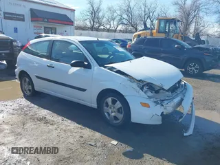 2003 Ford Focus ZX3 z VIN 3FAFP31333R106050, wystawiony jako IAAI lot #41659209 z przebiegiem 116 753 mil mil oraz . Historia ofert i sprzedaży dostępna na DreamBid. Obrazek 1.