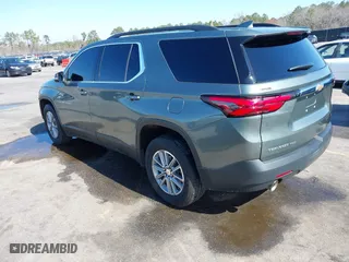 2022 Chevrolet Traverse LT Leather with VIN 1GNEVHKWXNJ141805, listed as a IAAI auction lot 41641352 with 71,504 mi miles. Bid and sale history available at carsss.com. Image 3.