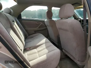 1997 Toyota Camry LE z VIN 4T1BG22K6VU815524, wystawiony jako Copart lot #57466415 z przebiegiem Nie podano mil oraz Szkoda całkowita • Salvage title. Historia ofert i sprzedaży dostępna na DreamBid. Obrazek 10.