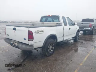 1997 Ford F-150 XL with VIN 1FTDX1863VNB01474, listed as a IAAI auction lot 41446672 with 223,296 mi miles. Bid and sale history available at carsss.com. Image 4.