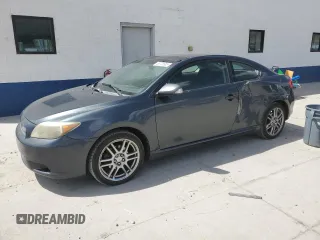 2006 Scion tC z VIN JTKDE167560132363, wystawiony jako Copart lot #53741005 z przebiegiem 160 286 mil mil oraz Szkody całkowita. Historia ofert i sprzedaży dostępna na DreamBid. Obrazek 1.