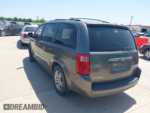 2010 Dodge Grand Caravan Crew with VIN 2D4RN6DX5AR350236, listed as a IAAI auction lot 41996674 with 199,810 mi miles and . Bid and sale history available at DreamBid. Image 3.