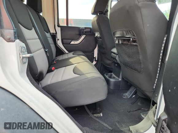 2015 Jeep Wrangler Unlimited Rubicon with VIN 1C4BJWFGXFL518301, listed as a Copart auction lot 61910775 with 153,945 mi miles and Clean title. Bid and sale history available at DreamBid. Image 11.