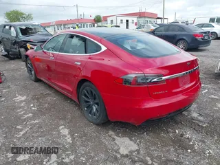 2018 Tesla Model S 75D with VIN 5YJSA1E21JF275546, listed as a IAAI auction lot 42061595 with Not Provided miles and . Bid and sale history available at DreamBid. Image 3.