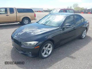 2014 BMW 3 Series 328i xDrive with VIN WBA3B3C56EJ981322, listed as a IAAI auction lot 42104530 with 104,376 mi miles. Bid and sale history available at carsss.com. Image 17.