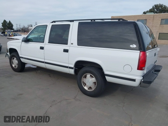 1997 Chevrolet Suburban with VIN 3GNFK16R9VG187426, listed as a IAAI auction lot 41678063 with 131,387 mi miles. Bid and sale history available at carsss.com. Image 3.