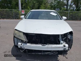 2013 Lexus ES 300h Hybrid with VIN JTHBW1GG0D2002520, listed as a IAAI auction lot 42049567 with 195,538 mi miles. Bid and sale history available at carsss.com. Image 13.