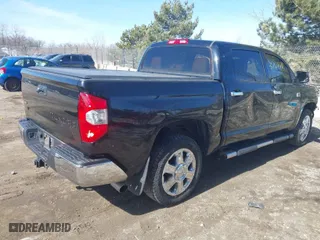 2014 Toyota Tundra 4WD Truck Platinum with VIN 5TFAW5F15EX351968, listed as a IAAI auction lot 41764411 with 146,899 mi miles. Bid and sale history available at carsss.com. Image 4.