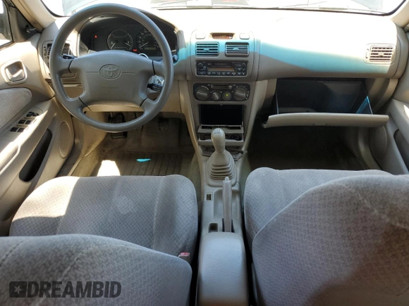 1999 Toyota Corolla VE with VIN 1NXBR12E7XZ240321, listed as a Copart auction lot 64259115 with 144,145 mi miles and Salvage title. Bid and sale history available at DreamBid. Image 8.