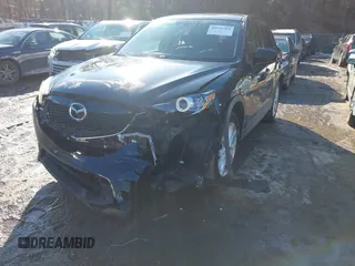 2014 Mazda CX-5 Grand Touring with VIN JM3KE4DY1E0303658, listed as a IAAI auction lot 41536769 with 158,777 mi miles. Bid and sale history available at carsss.com. Image 6.