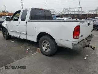 2000 Ford F-150 XL with VIN 1FTRX17L5YKA74815, listed as a Copart auction lot 85821444 with 0 mi miles and Salvage Title. Bid and sale history available at carsss.com. Image 2.