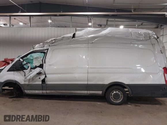 2023 Ford Transit Cargo with VIN 1FTBW3X87PKB39433, listed as a IAAI auction lot 41151064 with Not provided miles and . Bid and sale history available at DreamBid. Image 14.