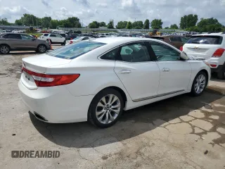 2012 Hyundai Azera z VIN KMHFG4JG6CA153582, wystawiony jako Copart lot #64809485 z przebiegiem 79 425 mil mil oraz Czysty tytuł • Clean title. Historia ofert i sprzedaży dostępna na DreamBid. Obrazek 3.