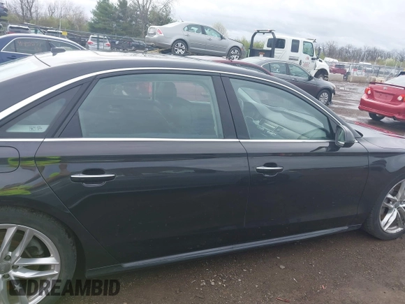 2016 Audi A8 L 4.0T Sport with VIN WAU43AFD3GN020763, listed as a IAAI auction lot 41951858 with 104,563 mi miles. Bid and sale history available at carsss.com. Image 14.