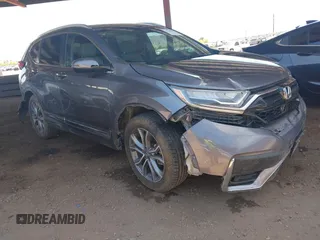 2020 Honda CR-V Touring with VIN 2HKRW2H9XLH649543, listed as a IAAI auction lot 42149076 with 79,562 mi miles and . Bid and sale history available at DreamBid. Image 1.