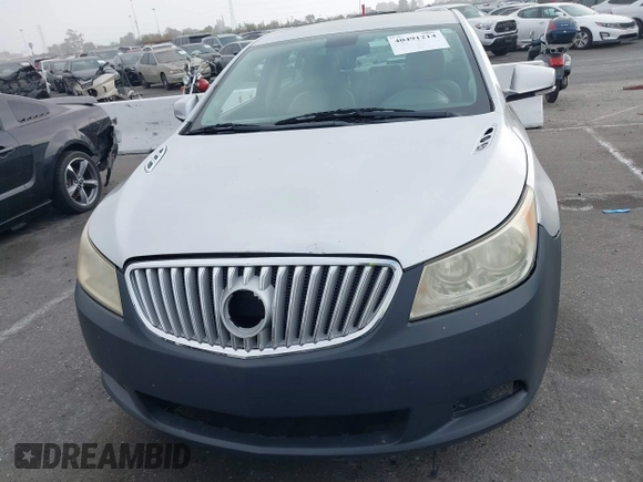 2012 Buick LaCrosse Premium 1 with VIN 1G4GE5E3XCF168614, listed as a IAAI auction lot 40491214 with 215,742 mi miles and . Bid and sale history available at DreamBid. Image 12.