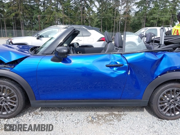 2025 MINI Convertible with VIN WMW23GX01S2X08664, listed as a IAAI auction lot 42506008 with 1,641 mi miles and . Bid and sale history available at DreamBid. Image 15.