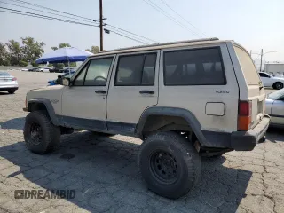 1996 Jeep Cherokee Sport with VIN 1J4FJ68S4TL146513, listed as a Copart auction lot 71039984 with 330,765 mi miles and Clean Title. Bid and sale history available at carsss.com. Image 2.