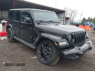 2023 Jeep Wrangler Sahara with VIN 1C4HJXEN4PW533148, listed as a IAAI auction lot 41476541 with 35,195 mi miles. Bid and sale history available at carsss.com. Image 1.
