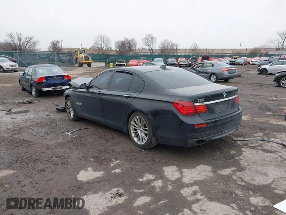 2015 BMW 7 Series 750i xDrive with VIN WBAYB6C59FD965820, listed as a IAAI auction lot 41558215 with 142,617 mi miles. Bid and sale history available at carsss.com. Image 3.