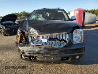 2011 GMC Yukon SLT with VIN 1GKS1CE01BR391954, listed as a Copart auction lot 82570594 with 0 mi miles and Salvage Title. Bid and sale history available at carsss.com. Image 5.