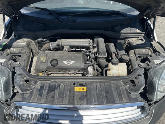 2012 MINI Countryman with VIN WMWZB3C52CWM05723, listed as a Copart auction lot 63713495 with 114,433 mi miles and Clean title. Bid and sale history available at DreamBid. Image 7.