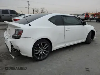 2014 Scion tC z VIN JTKJF5C7XE3079538, wystawiony jako Copart lot #85018414 z przebiegiem 136 905 mil mil oraz Czysty tytuł • Clean title. Historia ofert i sprzedaży dostępna na DreamBid. Obrazek 3.