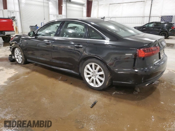 2016 Audi A6 Prestige with VIN WAUHGAFC1GN017177, listed as a Copart auction lot 82557894 with 135,722 mi miles and Salvage title. Bid and sale history available at DreamBid. Image 2.