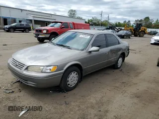 1999 Toyota Camry LE с VIN 4T1BG22K6XU404532, выставлен на аукционе Copart как лот 57449655 с пробегом 173 587 миль миль и Списание • Salvage title. История ставок и продаж доступна на DreamBid. Изображение 1.