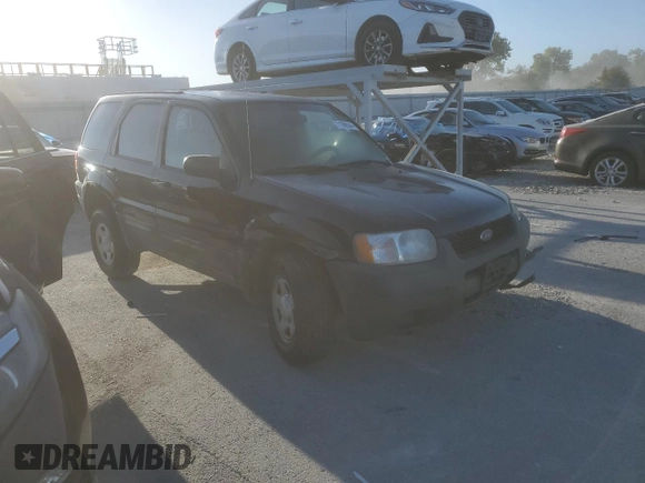 2004 Ford Escape XLS with VIN 1FMYU921X4KA14947, listed as a Copart auction lot 71589544 with 173,890 mi miles and Salvage Title. Bid and sale history available at DreamBid. Image 4.