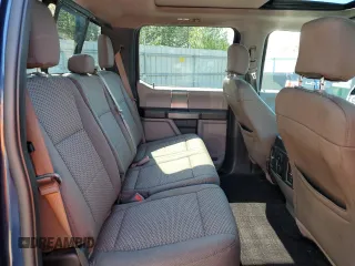 2015 Ford F-150 XLT with VIN 1FTEW1EP7FKE12574, listed as a Copart auction lot 59519985 with 133,337 mi miles and Salvage title. Bid and sale history available at DreamBid. Image 10.