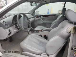 2000 Mercedes-Benz CLK 320/430 with VIN WDBLK65G9YT052770, listed as a Copart auction lot 79308624 with 63,567 mi miles and Salvage Title. Bid and sale history available at DreamBid. Image 7.