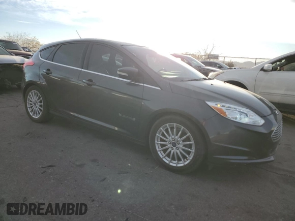 2015 Ford Focus Electric with VIN 1FADP3R40FL348785, listed as a Copart auction lot 84516374 with 85,633 mi miles and Salvage title. Bid and sale history available at DreamBid. Image 4.