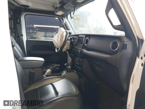2018 Jeep Wrangler Unlimited Sahara with VIN 1C4HJXEG3JW116404, listed as a IAAI auction lot 42152506 with 57,727 mi miles and . Bid and sale history available at DreamBid. Image 5.