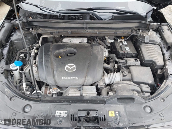2020 Mazda CX-5 Touring with VIN JM3KFACM9L0770933, listed as a IAAI auction lot 41921464 with 75,997 mi miles. Bid and sale history available at carsss.com. Image 10.