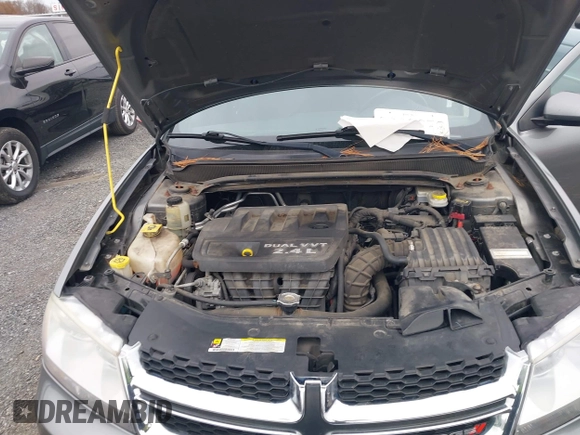2013 Dodge Avenger SXT with VIN 1C3CDZCB6DN568480, listed as a IAAI auction lot 38104186 with 129,203 mi miles and . Bid and sale history available at DreamBid. Image 10.