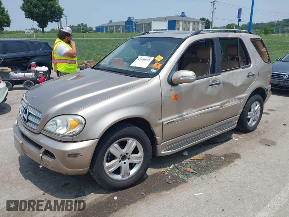 2005 Mercedes-Benz M 350 with VIN 4JGAB57E75A557255, listed as a IAAI auction lot 42443892 with 199,968 mi miles and . Bid and sale history available at DreamBid. Image 2.