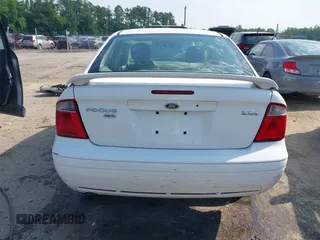 2005 Ford Focus S with VIN 1FAHP34N45W230950, listed as a IAAI auction lot 42467778 with 203,697 mi miles and . Bid and sale history available at DreamBid. Image 16.