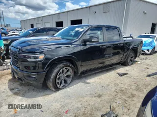 2020 Ram 1500 Limited with VIN 1C6SRFHT3LN415134, listed as a Copart auction lot 62964695 with 87,125 mi miles and Salvage title. Bid and sale history available at DreamBid. Image 1.