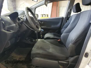 2009 Honda Fit Sport with VIN JHMGE88419S026712, listed as a Copart auction lot 51165865 with 54,586 mi miles and Salvage Title. Bid and sale history available at carsss.com. Image 7.